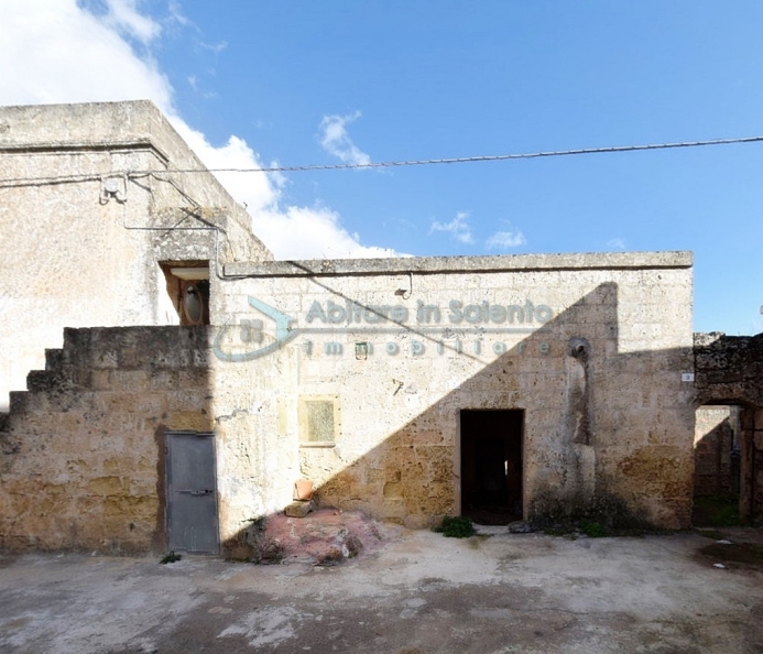 Rustic building with star vaults and garden