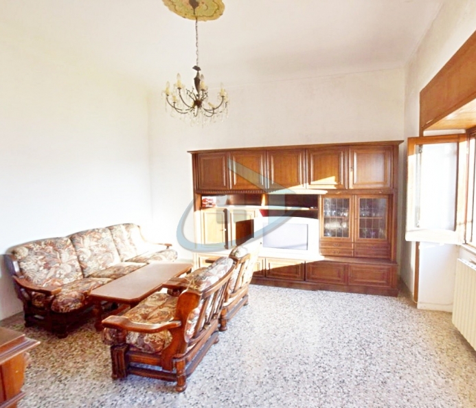 Building with Commercial Spaces and Apartment